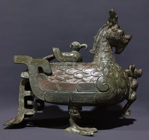 An Archaic Bronze Beast-Shaped Zun,With Inscription