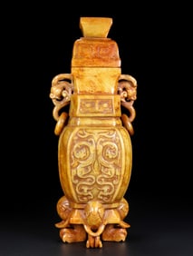An Archaic Gaogu yu Dragon Pattern Double-Ears and Elephant-legs Bottle
