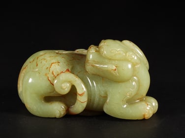 An Exquisite White Jade Auspicious Beast Ornament