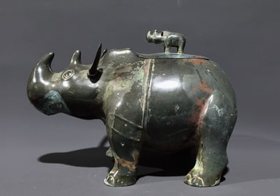 An Archaic Bronze Rhinoceros-Shaped Zun