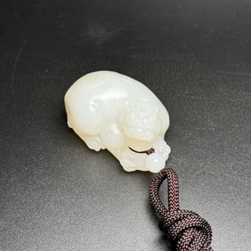 An Exquisite White Jade Wealth-Attracting Creature Pendant