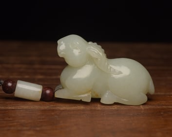 An Exquisite White Jade Sheep Pendant