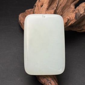 An Exquisite White Jade Pendant