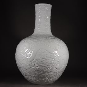 A Huge White Glazed Carved Auspicious Cloud and Dragon Pattern Vase