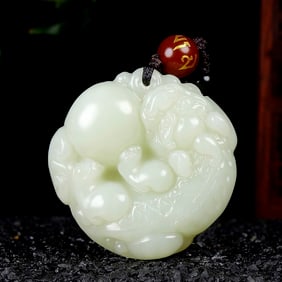 An Exquisite White Jade Auspicious Beast Pendant