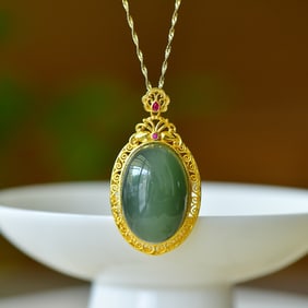 An Exquisite Sterling Silver-Gold Plated Inlaid Greenish Jade Pendant