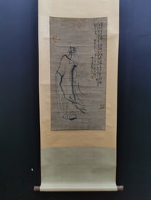 A vertical scroll of Chinese ink figure painting on silk