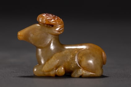 A Rare Archaic Jade Sheep Ornament