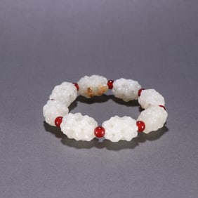 A Rare White Jade Lu Lu Tong Bracelets