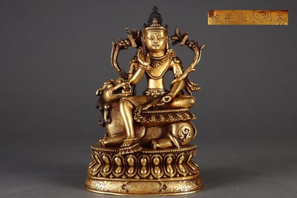 A Rare Gilded Purple Copper Body Lion-Roaring Guanyin Seated Statue