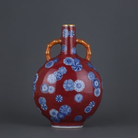 A Rare Red Glazed Blue and White Flower Pattern Vase
