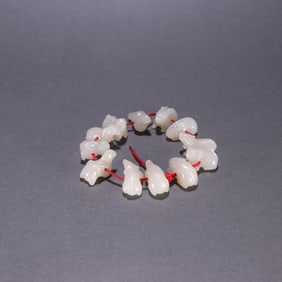 A Rare White Jade Zodiac Bracelets