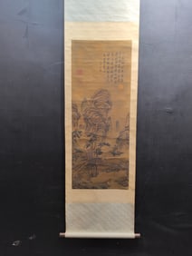 A vertical scroll of Chinese ink landscape painting on silk