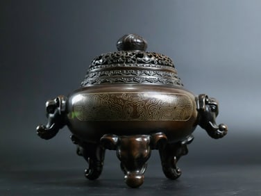 A Rare Red Copper Silver-Inlaid Elephant-Ears Incense Censer