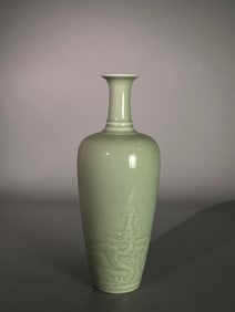 A Rare Celadon Glazed Carved Chi Dragon Pattern Vase