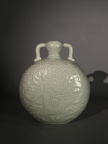 A Rare Celadon Glazed Carved Seawater Dragon Pattern Vase