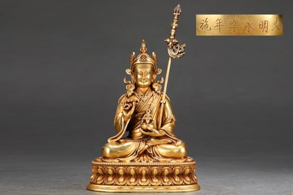 A Rare Gilded Purple Copper Body Guru Rinpoche Statue