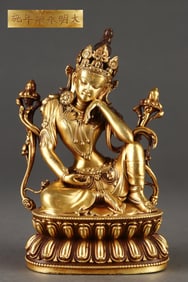A Rare Gilded Purple Copper Body Green Tara Seated Statue