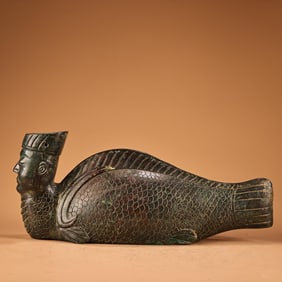 A Rare Bronze Human-faced Fish Ornament
