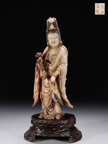 A Rare Hibiscus Stone Carved Ruyi Avalokitesvara Standing Statue