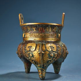 A Rare Bronze Censer with Gold-Inlaid Longevity Face Pattern