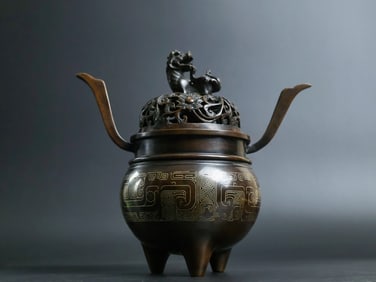 A Rare Red Copper Silver-Inlaid Double-Ears Incense Censer