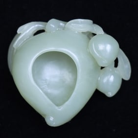 A Rare Hetian Jade Peach-shaped Washer