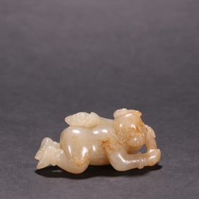 A Rare Hetian Jade Child Holding Lotus Ornament