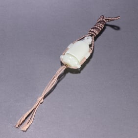 A Rare White Jade Buddha Pendant