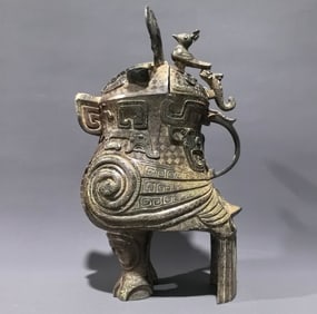 An Archaic Bronze Chi-Dragon Pattern Ancient Owl-Shaped Zun