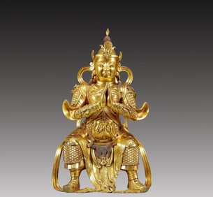 A Solemn Gilt Bronze Statue of Skanda