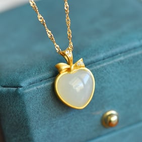An Exquisite Sterling Silver-Gold Plated Inlaid White Jade Pendant