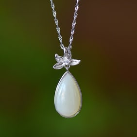 An Exquisite Sterling Silver Inlaid White Jade Pendant