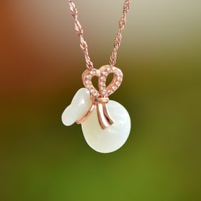 An Exquisite Sterling Silver-Gold Plated Inlaid White Jade Pendant