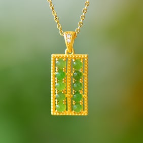 An Exquisite Sterling Silver-Gold Plated Inlaid Jasper Pendant