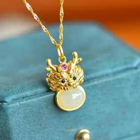 An Exquisite Sterling Silver-Gold Plated Inlaid White Jade Pendant