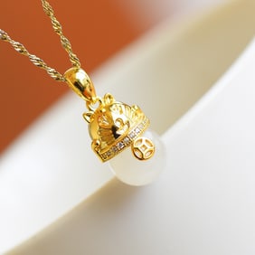 An Exquisite Sterling Silver-Gold Plated Inlaid White Jade Pendant