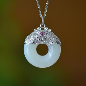 An Exquisite Sterling Silver Inlaid White Jade Pendant
