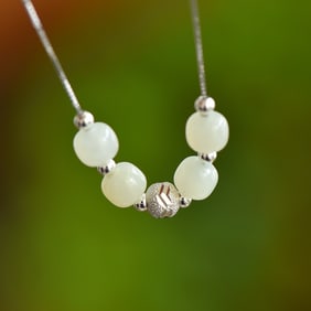 An Exquisite Sterling Silver Inlaid White Jade Bracelet