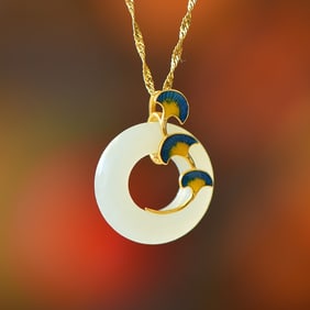 An Exquisite Sterling Silver-Gold Plated Inlaid White Jade Pendant