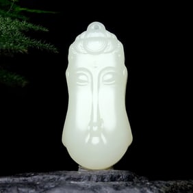 An Exquisite White Jade Buddha-Head Pendant