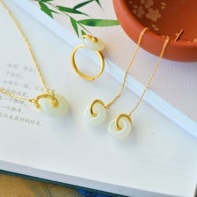 A Set of Fine Sterling Silver-Gold Plated Inlaid White Jade Jewelrys