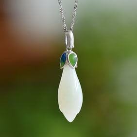 An Exquisite Sterling Silver Inlaid White Jade Pendant