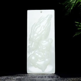 An Exquisite White Jade Dragon Pattern Pendant
