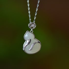 An Exquisite Sterling Silver Inlaid White Jade Pendant