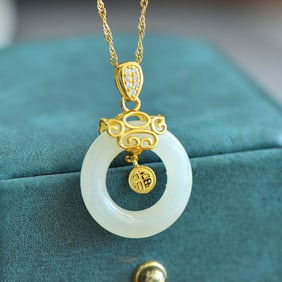An Exquisite Sterling Silver-Gold Plated Inlaid White Jade Pendant