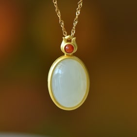 An Exquisite Sterling Silver-Gold Plated Inlaid White Jade Pendant