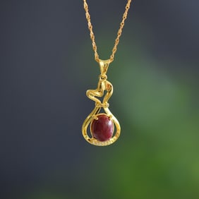 An Exquisite Sterling Silver-Gold Plated Inlaid Cinnabar Pendant