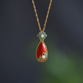 An Exquisite Sterling Silver-Gold Plated Inlaid Cinnabar Pendant