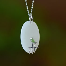An Exquisite Sterling Silver Inlaid White Jade Pendant